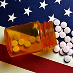 American-Healthcare-Prescription-Pills-and-Bottle-on-US-flag_thumbnail